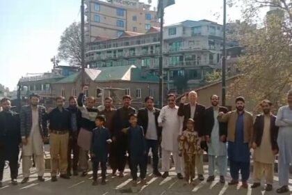 Pakistan Post employees stand shoulder-to-shoulder with the Pakistan Army