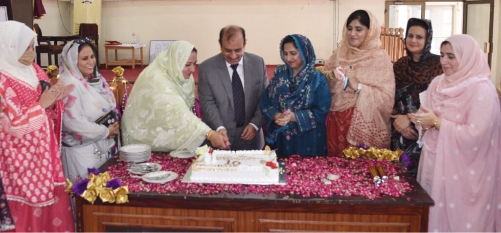 Award ceremony honoring top students and teachers at Abdul Wali Khan University Women