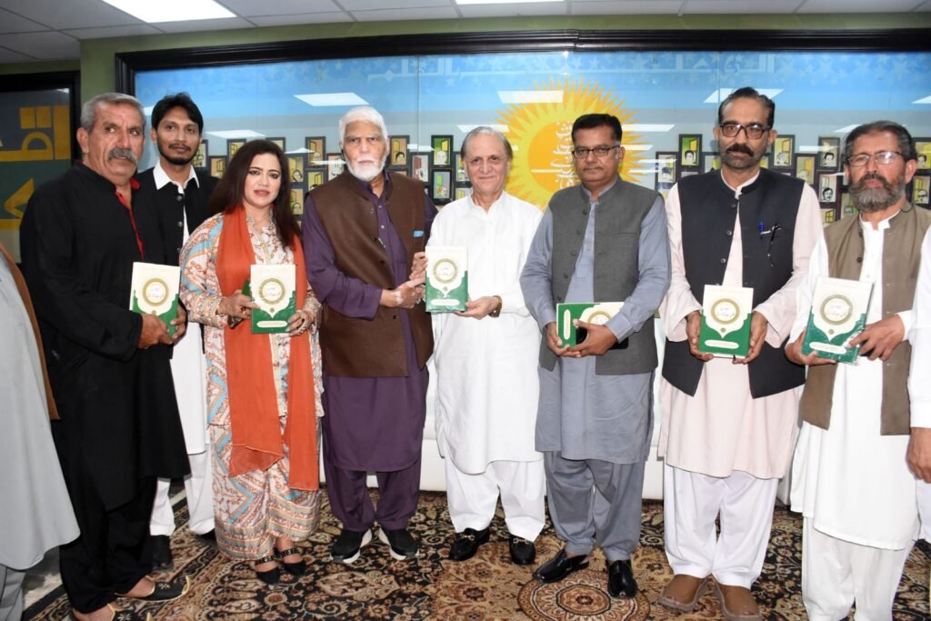 Guests and poets gather at the Kulliyat-e-Qadri launch ceremony in Islamabad to honor Allama Tanveer Qadri’s literary legacy.