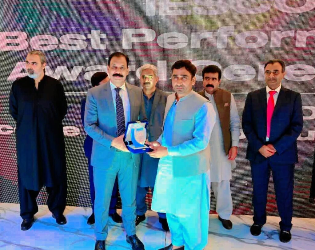SDO WAPDA Pind Dadan Khan receiving Best Performance Award at IESCO Head Office