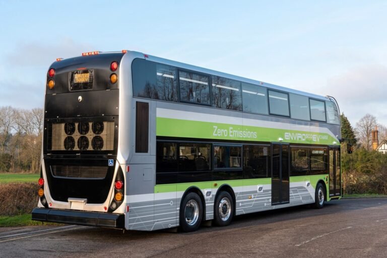 Double-decker bus parked at Hiran Minar during Punjab weekend tourism tour