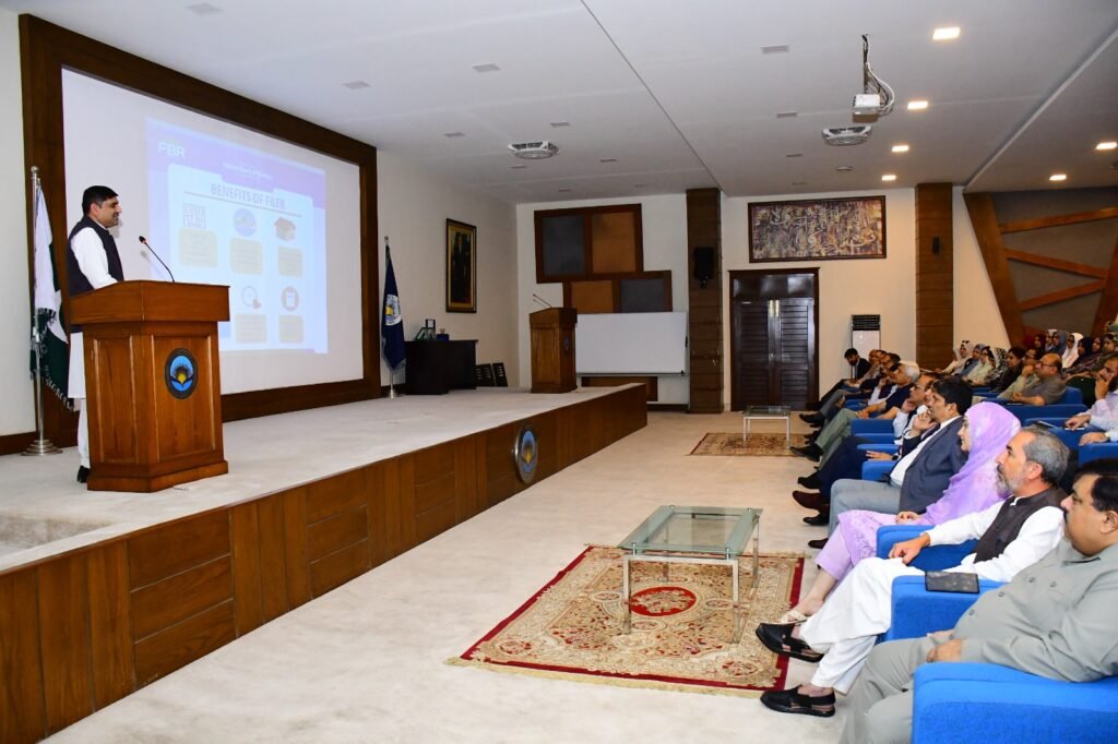 FBR officials addressing students during tax awareness session at HITEC University, Taxila