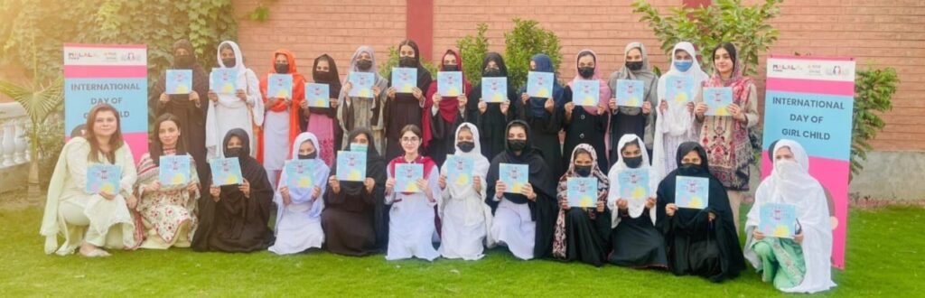 School girls in Peshawar celebrating International Day of the Girl Child through art and storytelling
