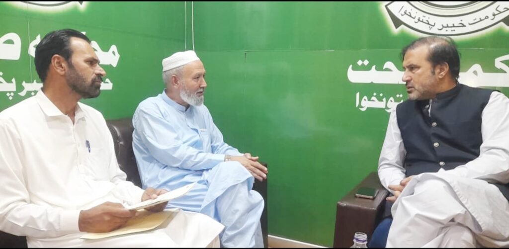 KPK CM Adviser Vows Healthcare Upgrades, Free Treatment for Journalists Ahtisham Ali Advocate discussing healthcare services in KPK with Mardan Press Club delegation