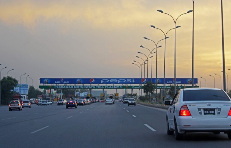 Traffic congestion near unmarked toll plaza lanes