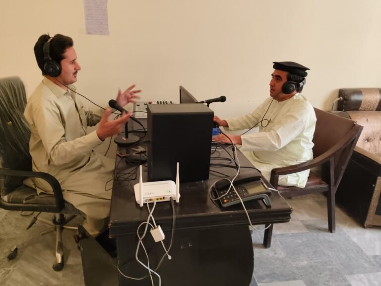 Radio hosts at Pakhtunkhwa Radio Wana studio resuming live broadcast after 18 months in South Waziristan.