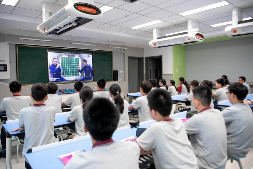 China's space station astronauts conducting experiments and AI support in orbit