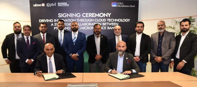 PTCL and LOLC officials signing a cloud services partnership agreement using the keyphrase LOLC.