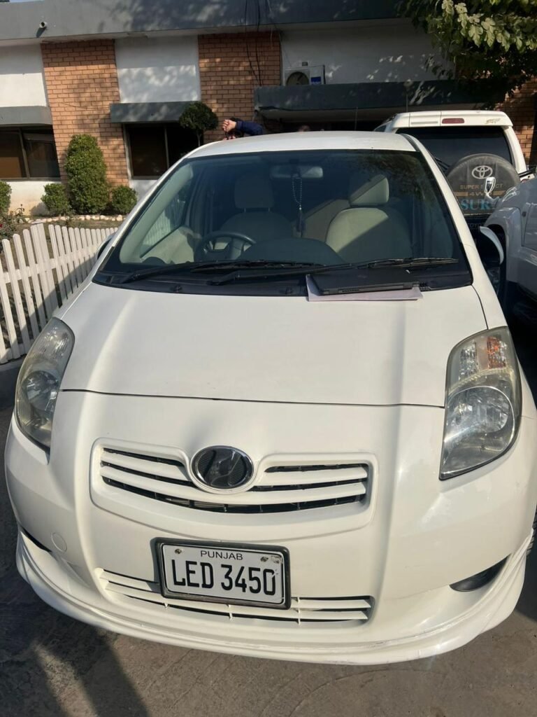 Customs Enforcement, Peshawar officials inspecting seized non-duty-paid vehicles