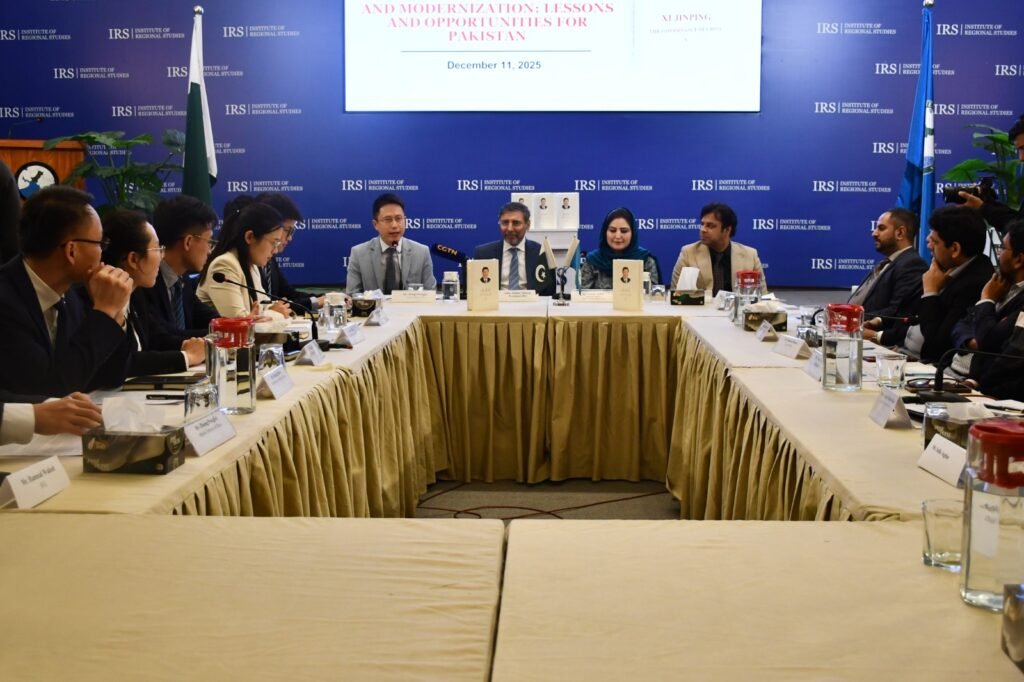 Delegates discuss development and governance models of China during a dialogue in Islamabad.