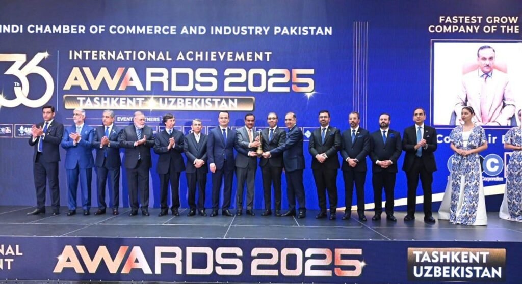 NLC receives recognition at Tashkent business awards Officials present an award to NLC during a business conference in Tashkent.