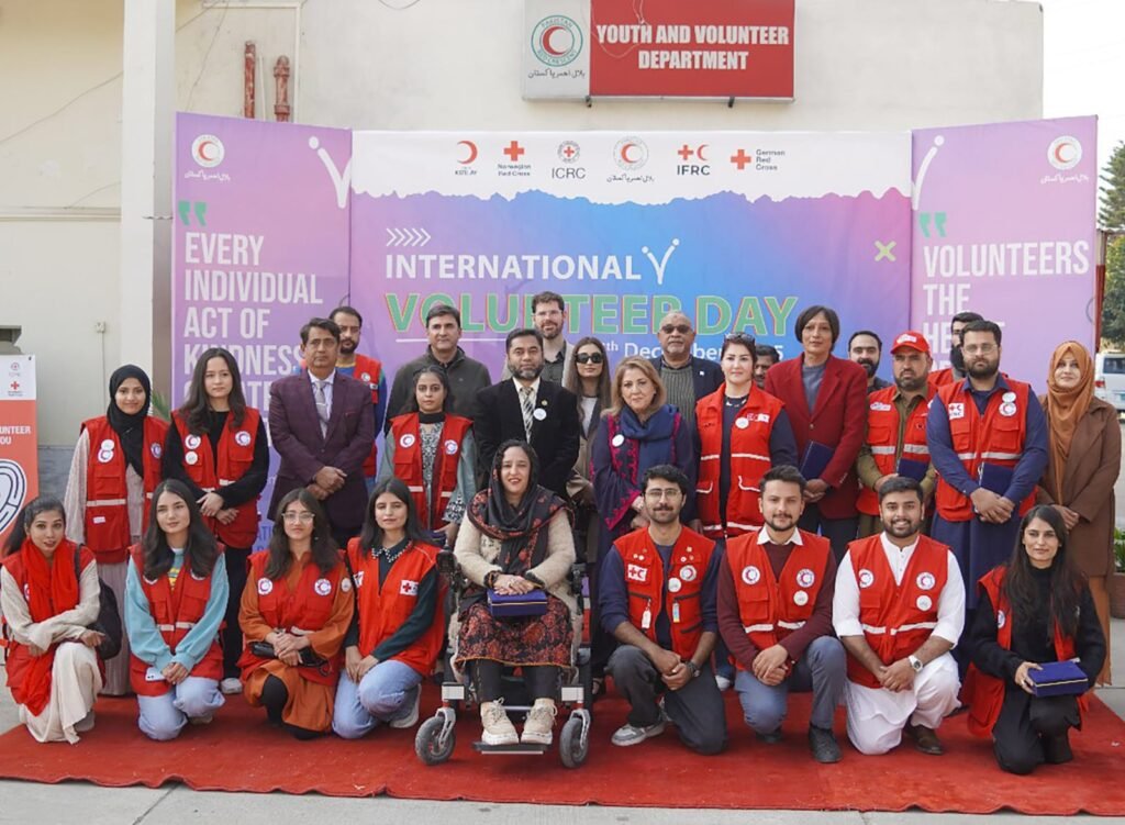 PRCS Marks International Volunteer Day with Tributes to the Spirit of Humanity PRCS volunteers and leaders marking International Volunteer Day at a ceremony.