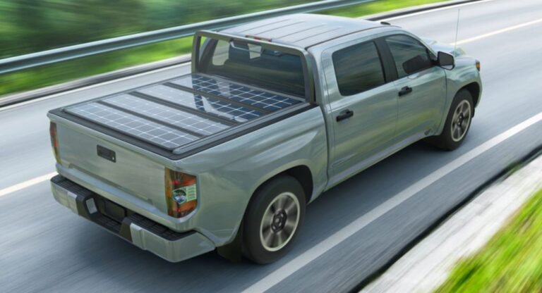 Rivian R1T fitted with Worksport solar tonneau cover for off-grid energy use.
