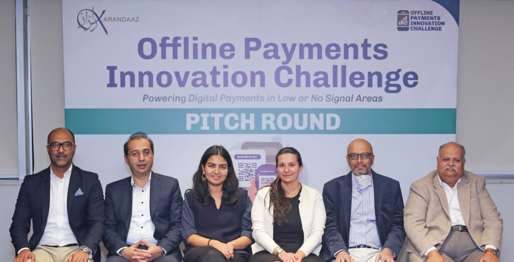 Judges review proposals at the Offline Payments Innovation Challenge to expand digital payments in Pakistan.