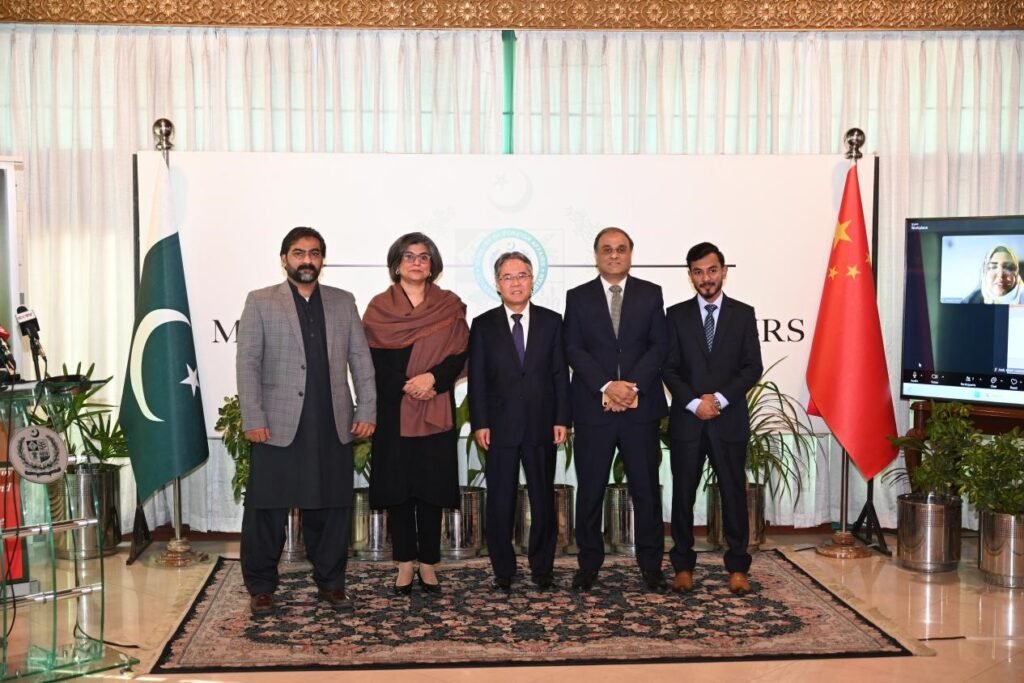 Officials attend a ceremony marking the China-Pakistan 75th anniversary with a commemorative badge competition.