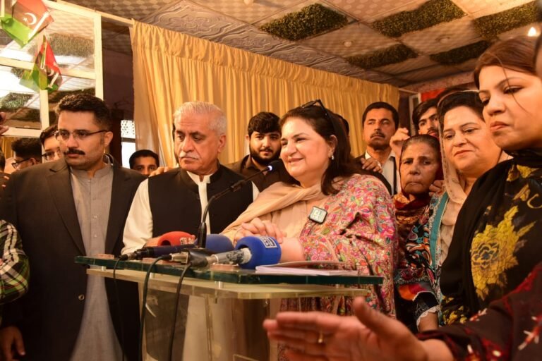 BISP Chairperson Rubina Khalid addresses beneficiaries during her visit to Lyari in Karachi.