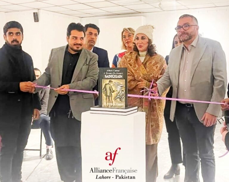 Visitors view Sadequain’s lithographs illustrating Albert Camus’ The Stranger at Alliance Française Lahore.