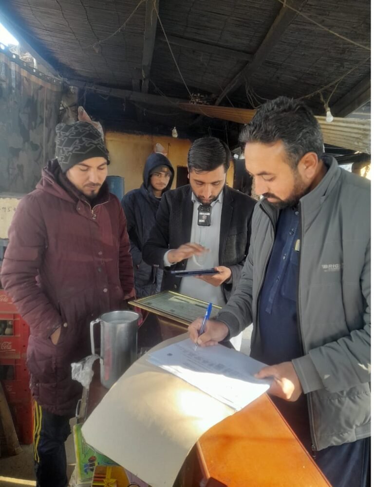 Food Safety Authority team collects water samples from DHQ Hospital Timergara canteen for testing.