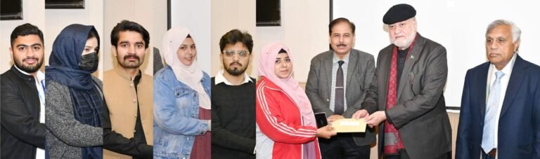 Federal minister distributes Pakistan Bait-ul-Mal scholarship cheques to students at PMAS Arid Agriculture University Rawalpindi.