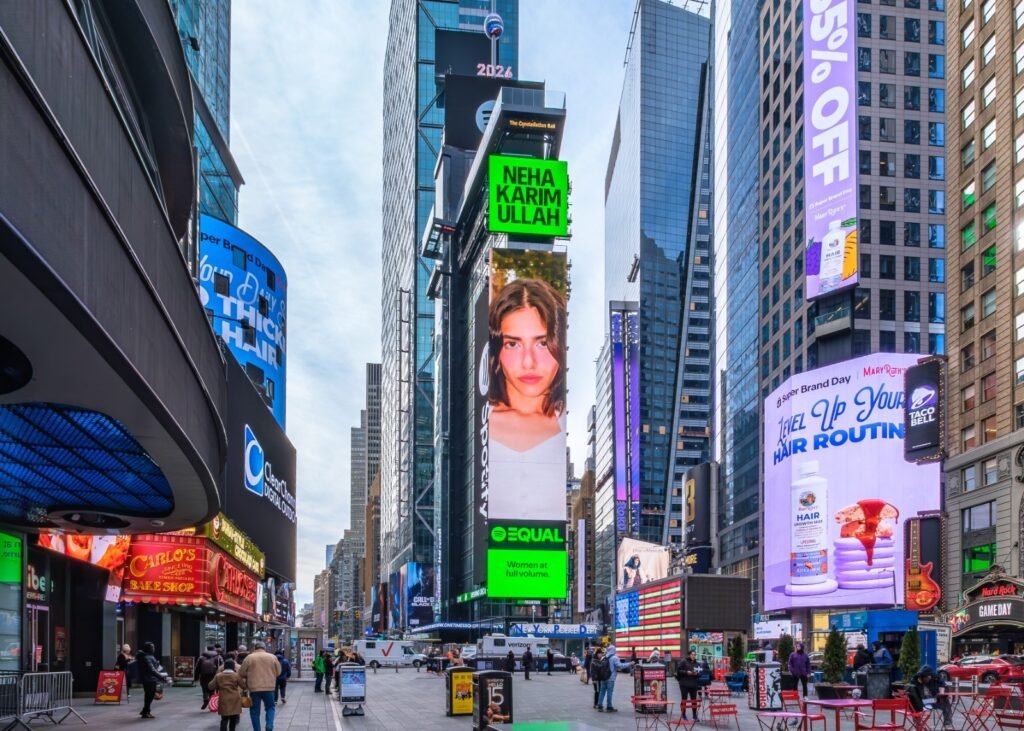 Pakistani artist Neha Karim Ullah featured as Spotify EQUAL Pakistan Ambassador on a Times Square digital billboard.
