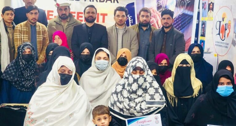 Group photo at an event.Students receiving certificates after completing IT Digital Skills Boot Camp in Upper Dir