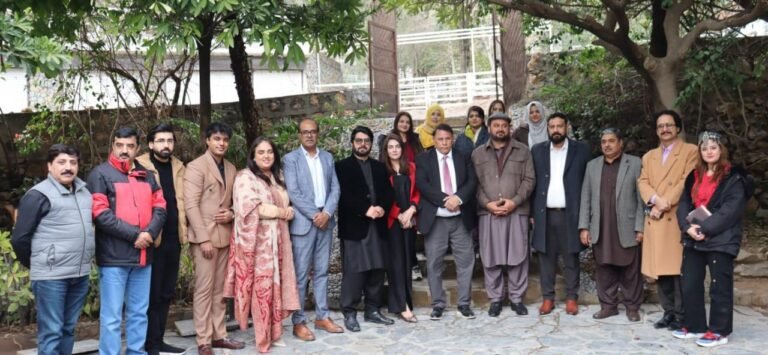 Participants attend a youth dialogue in Rawalpindi discussing digital employment and entrepreneurship opportunities.