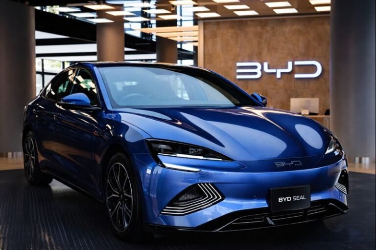 BYD electric vehicles displayed as the automaker reports a fifth consecutive monthly decline in sales.