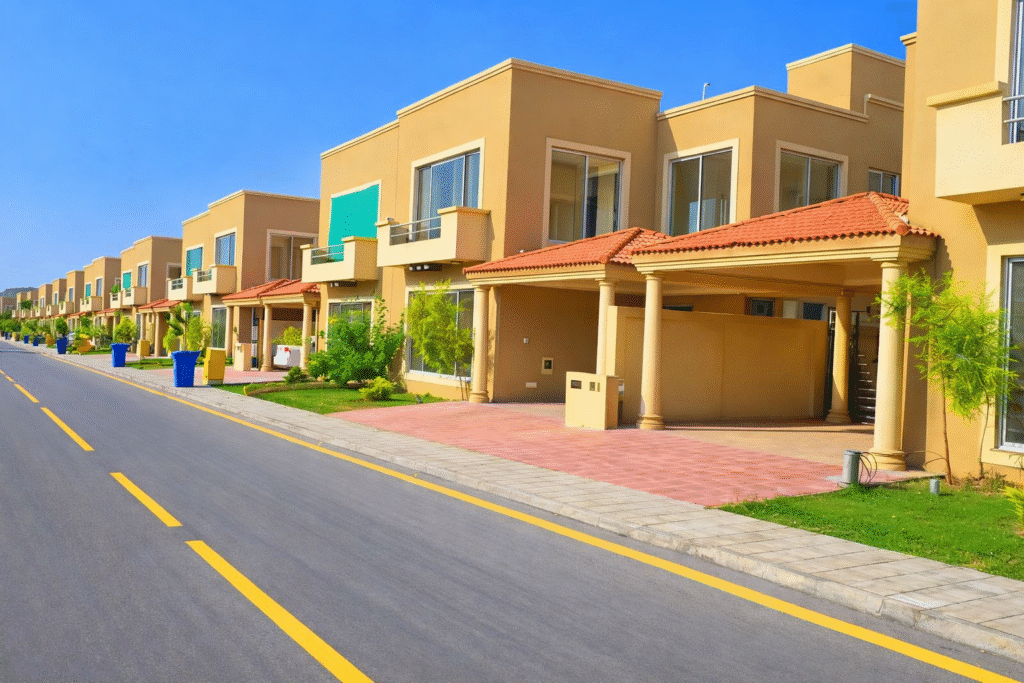 Mera Ghar–Mera Ashiana housing loan scheme office banner displayed in Pakistan.