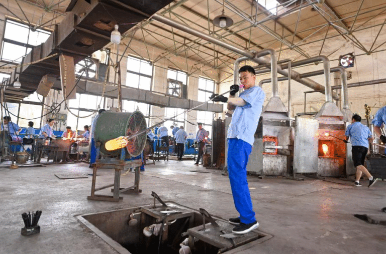 Artisans in Qixian County, Shanxi, demonstrate traditional glass-blowing techniques while exporting products worldwide