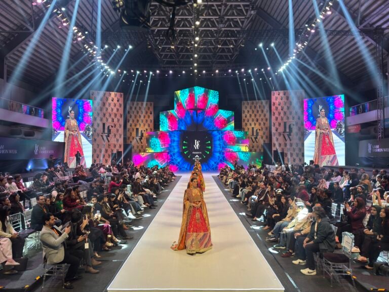 Designers present collections on the runway during Day 2 of LAAM Fashion Week in Lahore.