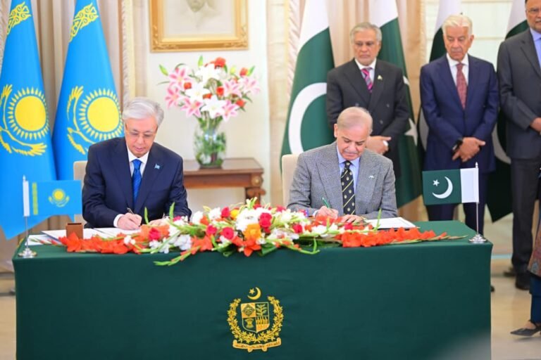 Prime Minister Shehbaz Sharif and President Kassym-Jomart Tokayev sign a joint declaration in Islamabad.