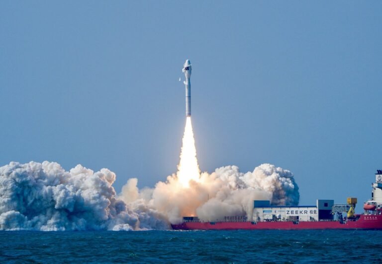 Engineers monitor screens as Pakistan launches PRSC-EO2 satellite aboard a Chinese sea-based rocket.