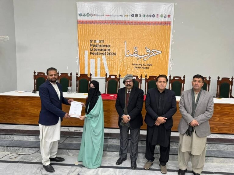 Speakers address audience during DOSTI Peshawar Literature Festival event at University of Swat.