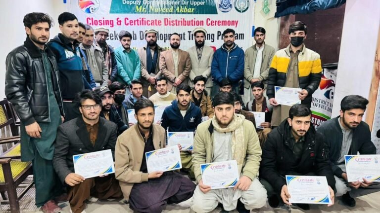 Students receive certificates after completing a web development short course in Upper Dir.