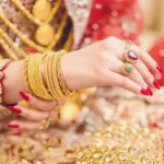 Gold bars showing Pakistan gold prices on October 23, 2026, with 24K gold falling Rs7,000 to Rs424,536 per tola.
