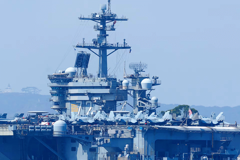 Iran claims drones struck the USS Abraham Lincoln aircraft carrier in the Sea of Oman near the Strait of Hormuz.
