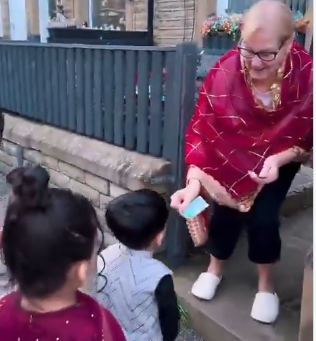 Viral video shows British woman giving Eidi to Muslim neighbours’ children on Eid
