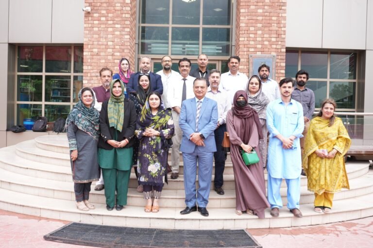 Visitors view artworks at ‘The Imperfect Canvas’ exhibition at COMSATS University Islamabad.