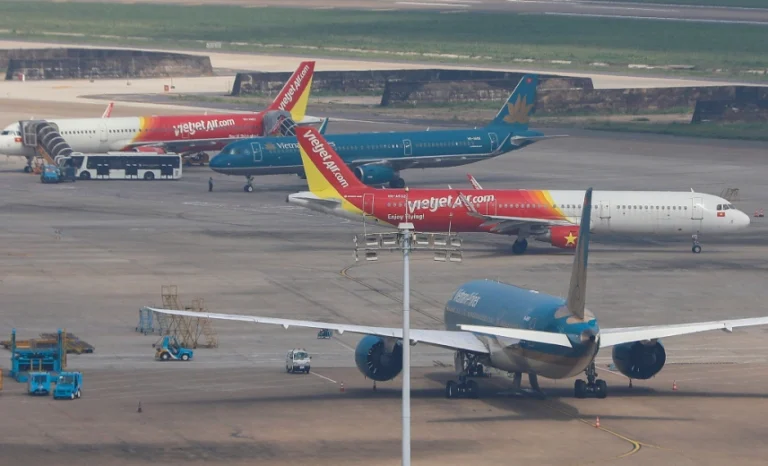 Asian airlines aircraft as jet fuel shortages deepen, forcing flight cuts and extra fuel loading.