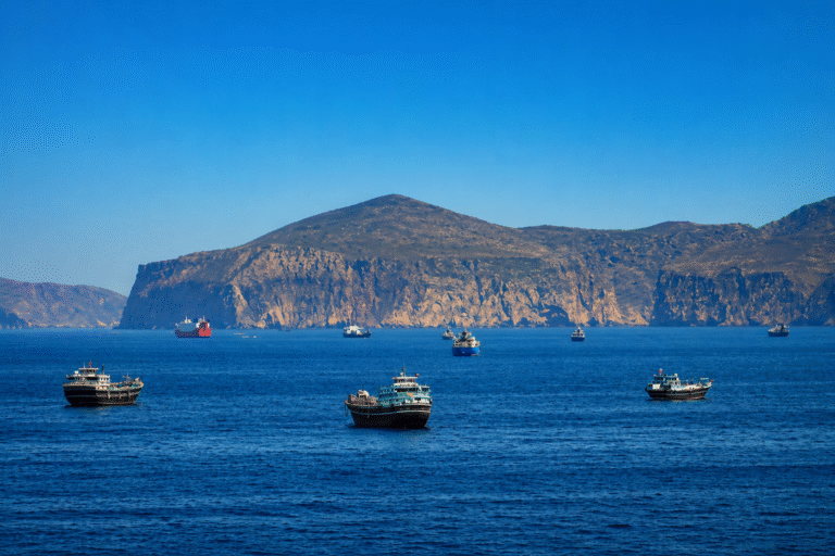 Commercial vessels transit the Strait of Hormuz as diplomatic talks advance towards reopening the strategic global shipping route.