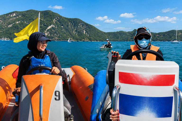 Image alt text: Pakistani sailors Zoya Asad Ali and Mehnaz Jamil after completing an international sailing judges seminar.