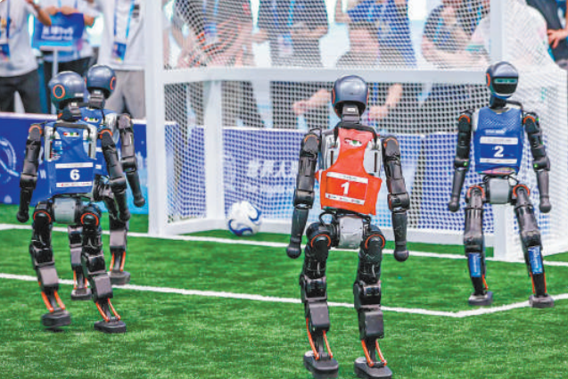 Chinese team turns humanoid robots into 'football stars' Chinese team turns humanoid robots into 'football stars'