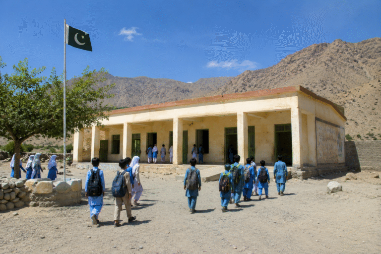 Students leave a school building after Balochistan announces summer vacations for schools due to rising temperatures.