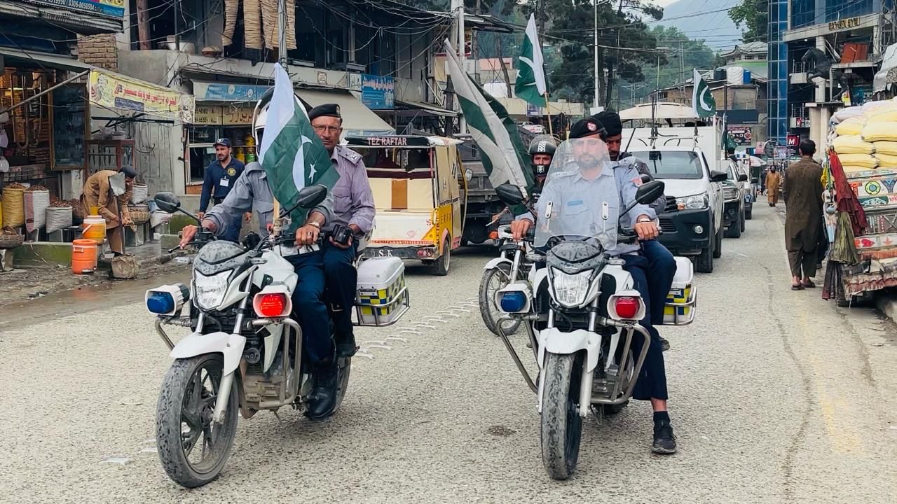 Upper Dir Police hold flag march to mark anniversary of Ma’arka-e-Haq victory
