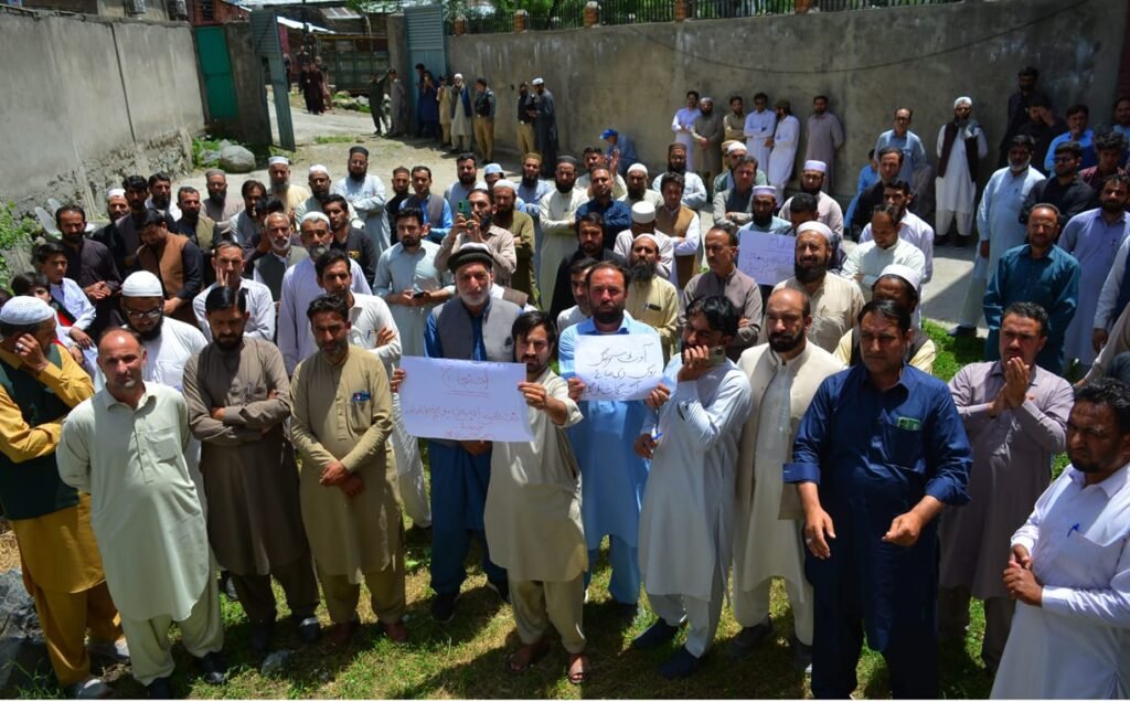 Government employees in Shangla protest outside the press club during a pen-down strike for their demands.