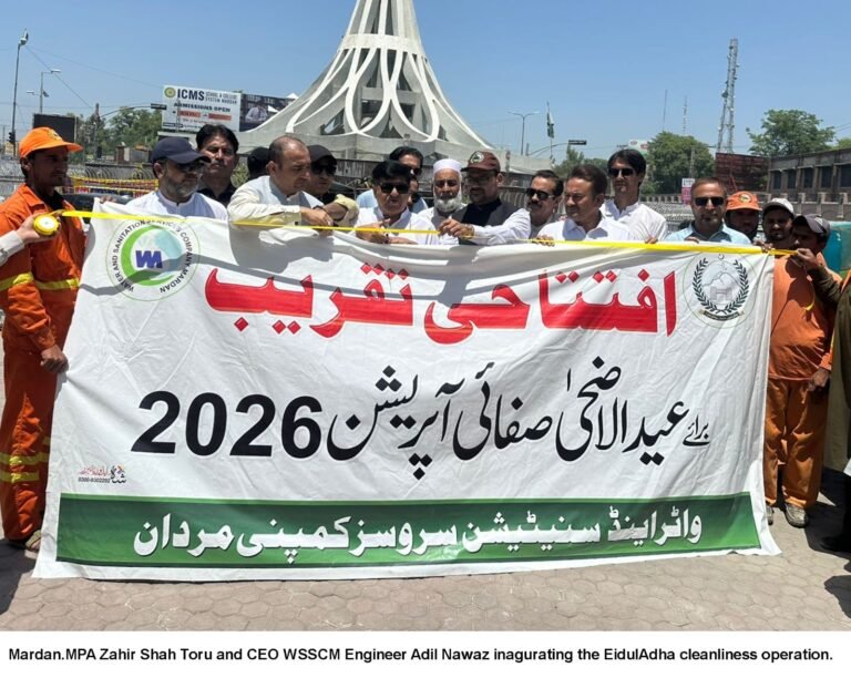 Sanitation workers collect sacrificial animal waste during WSSCM's Eid-ul-Adha operation in Mardan