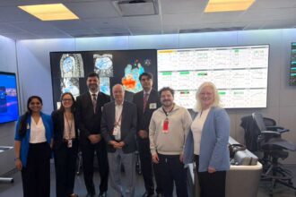 Pakistani officials discuss child mental health services during a visit to a US children's hospital.