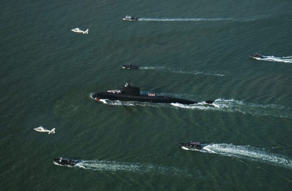 Pakistan Navy Hangor-class submarine PNS/M Hangor arrives in Karachi during a ceremonial welcome.