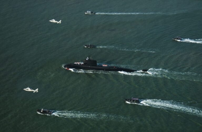 Pakistan Navy Hangor-class submarine PNS/M Hangor arrives in Karachi during a ceremonial welcome.