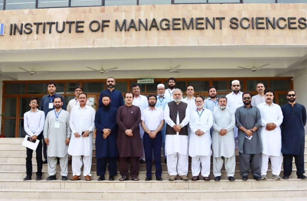 PESCO project management training participants attend a professional development session at IMSciences in Peshawar.